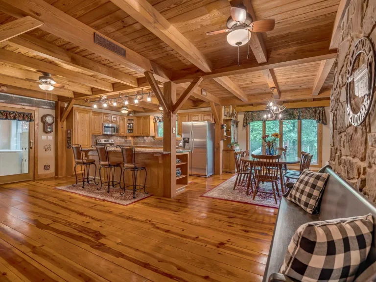 Timber frame kitchen and dining room with pine ceiling and exposed beams