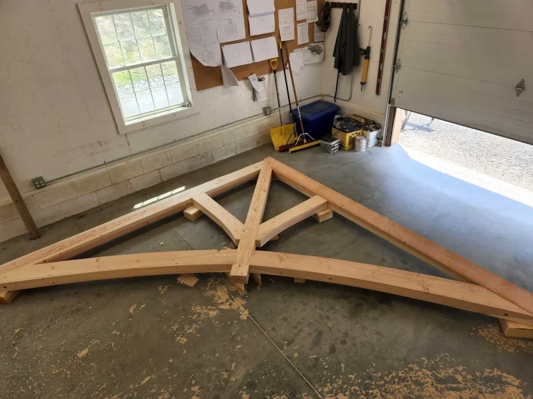 Curved timber frame truss assembled on the shop floor